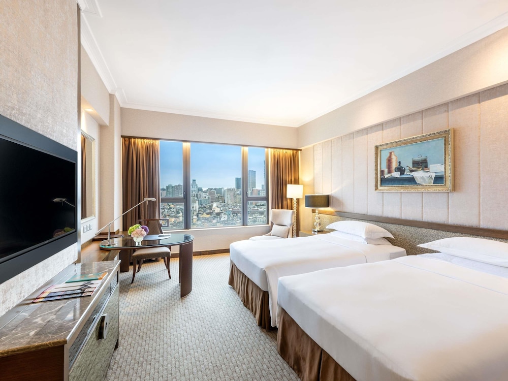 Habitación superior, 2 camas individuales, vistas a la ciudad del hotel Sofitel Macau At Ponte 16. Foto 6