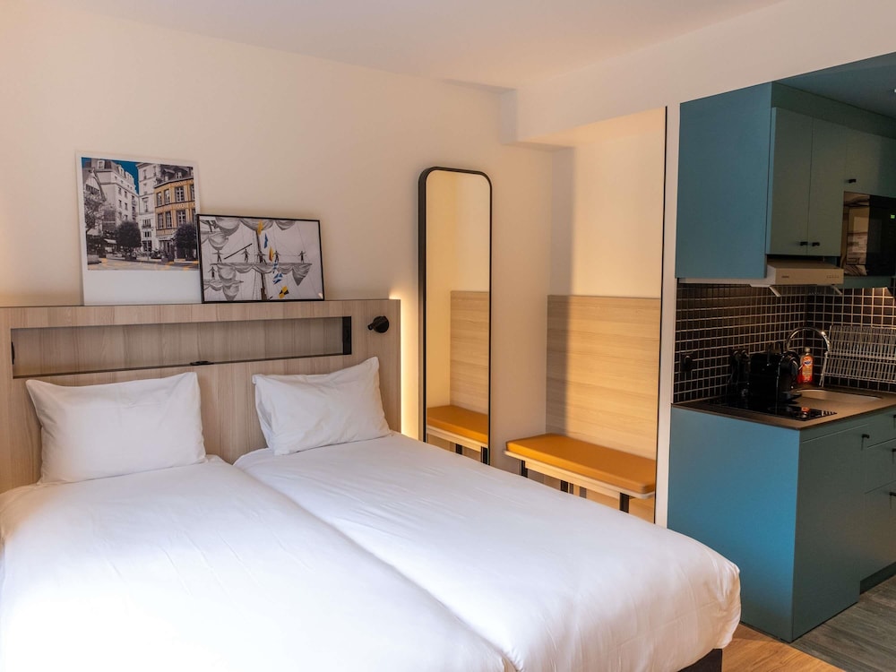 Estudio con dos camas individuales del hotel Aparthotel Adagio Access Rouen Centre Cathédrale. Foto 5