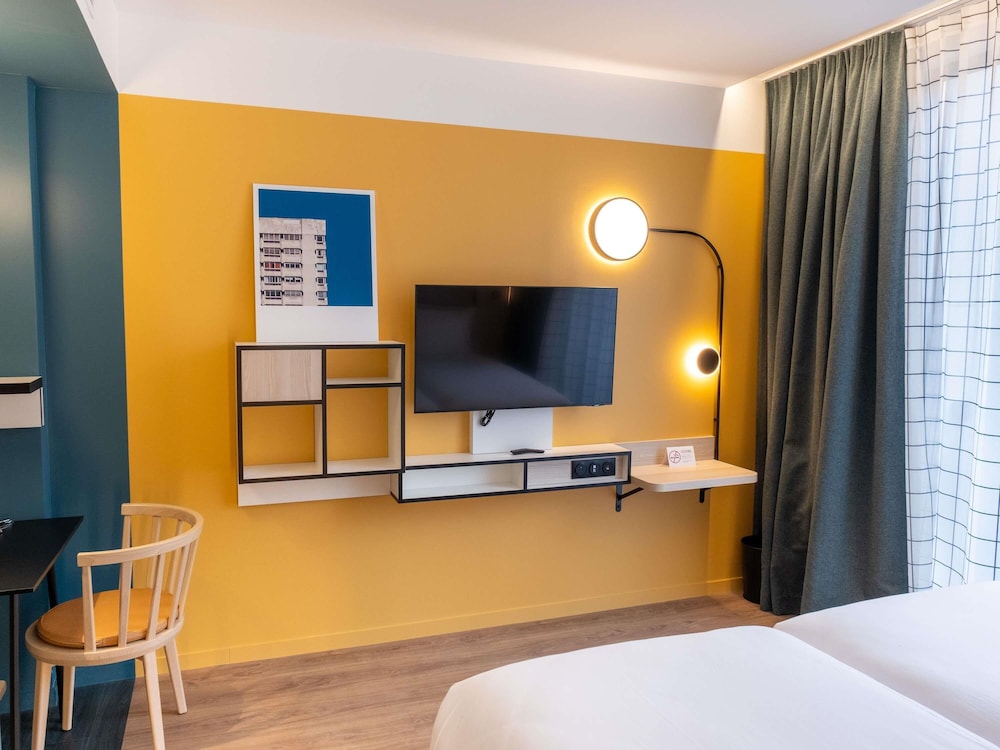 Estudio con dos camas individuales del hotel Aparthotel Adagio Access Rouen Centre Cathédrale. Foto 12