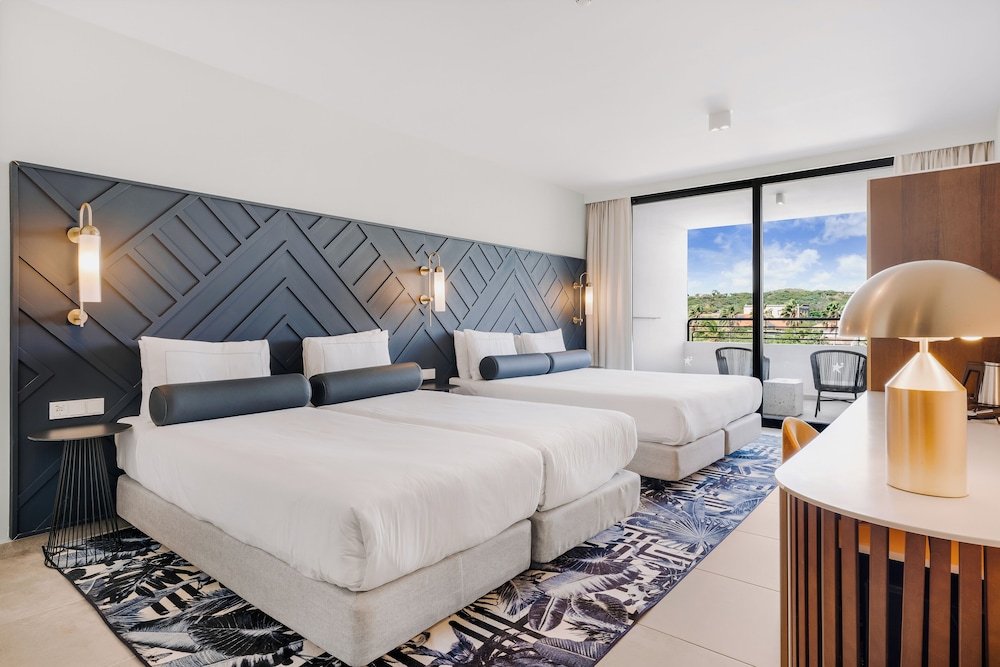 Habitación cuádruple (2 King Beds) del hotel Mangrove Beach Corendon Curacao. Foto 2