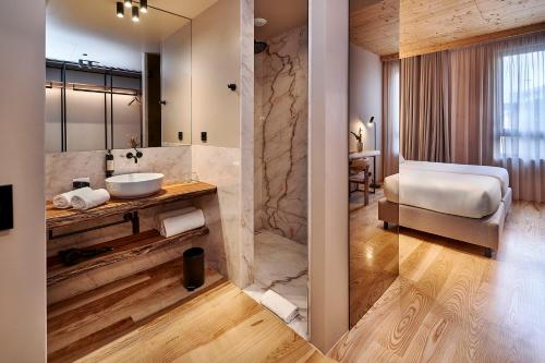 Habitación Doble Estándar - 1 o 2 camas del hotel The Log Porto Hotel by Piamonte Hotels. Foto 4