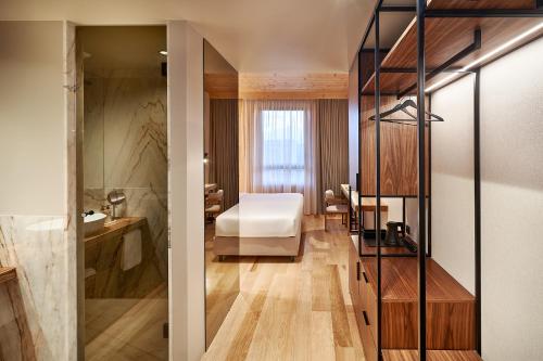 Habitación Doble Estándar - 1 o 2 camas del hotel The Log Porto Hotel by Piamonte Hotels. Foto 5