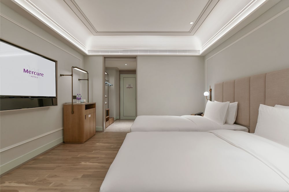 Habitación Deluxe, 2 camas individuales del hotel Mercure Guangzhou Nansha. Foto 4