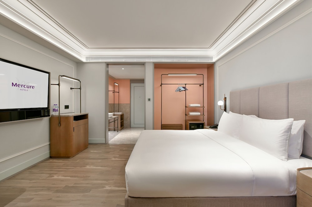 Habitación superior, 1 cama de matrimonio grande del hotel Mercure Guangzhou Nansha. Foto 3