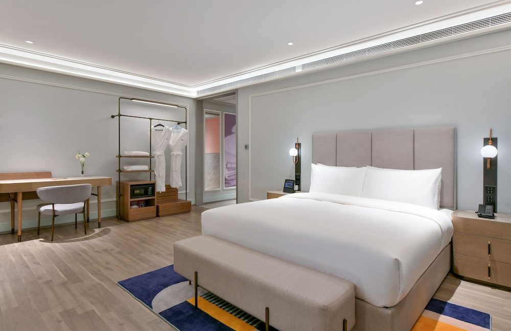 Suite superior, 1 cama de matrimonio grande del hotel Mercure Guangzhou Nansha. Foto 2