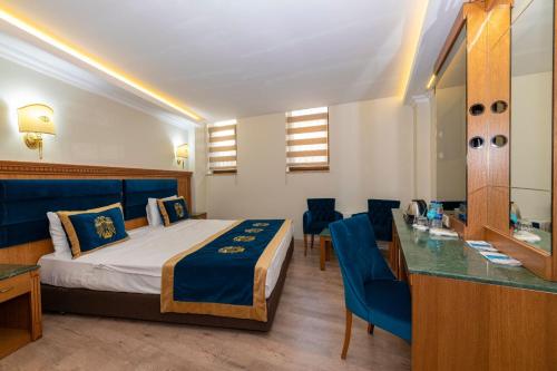Habitación Económica - Planta sótano del hotel The Byzantium and Suites - Special Class. Foto 2