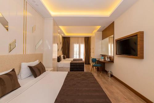 Habitación Familiar del hotel The Byzantium and Suites - Special Class. Foto 2