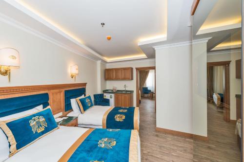 Habitación Familiar del hotel The Byzantium and Suites - Special Class. Foto 4