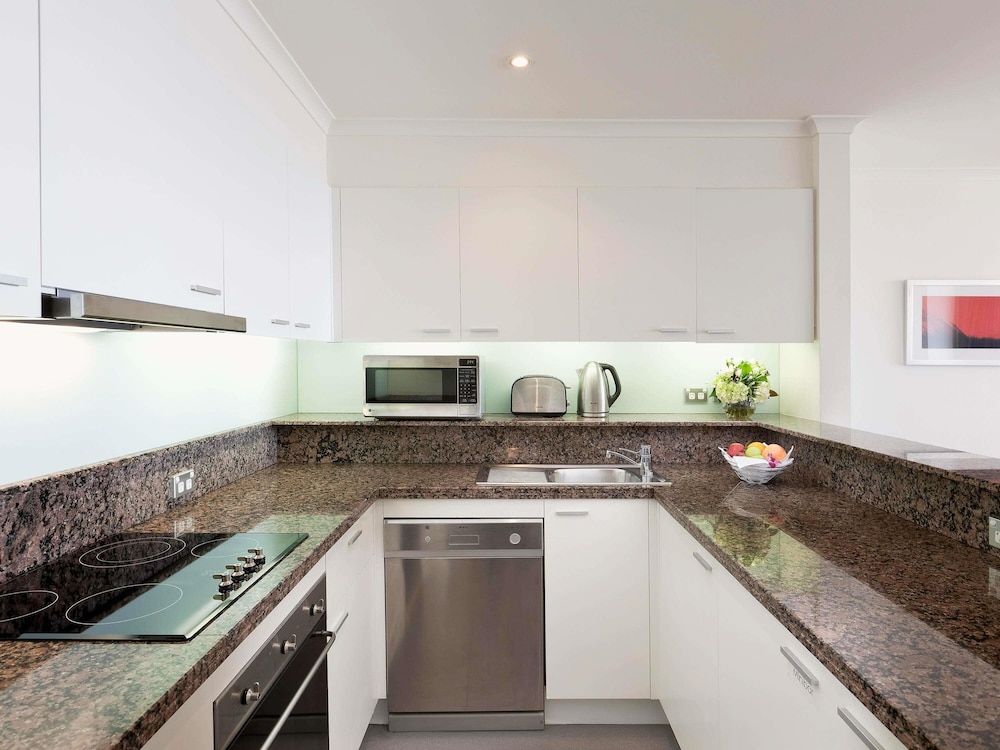 Suite apartamento con un dormitorio y vistas a la ciudad (sin renovar) del hotel The Sebel Quay West Suites Sydney. Foto 1