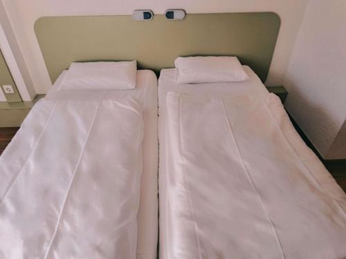 Habitación Doble con 2 camas individuales del hotel ibis budget Berlin Ost