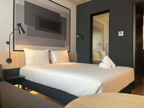 Habitación Doble Estándar con cama individual para un niño del hotel ibis Madrid Norte Las Tablas