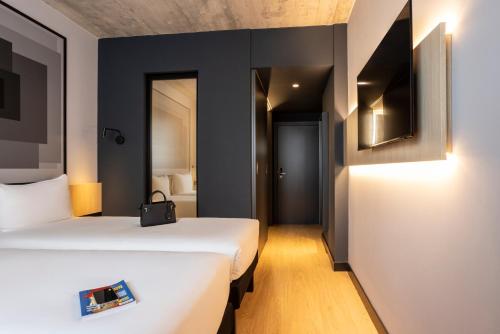 Habitación Doble Estándar - 2 camas del hotel ibis Madrid Norte Las Tablas. Foto 8
