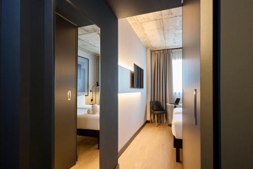 Habitación Doble Estándar - 2 camas del hotel ibis Madrid Norte Las Tablas. Foto 11