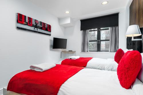 Habitación Doble Superior - 2 camas, con vistas a la ciudad del hotel The Whitechapel. Foto 4