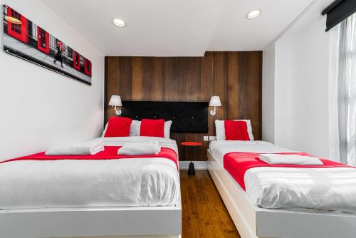 Habitación Triple Clásica del hotel The Whitechapel. Foto 5