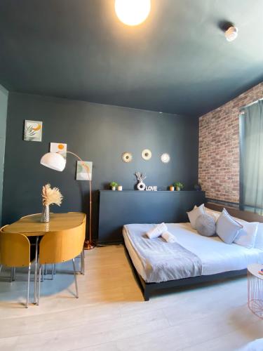 Estudio Con Cocina Familiar 2 Camas dobles del hotel Modern Studios Close To Hyde Park. Foto 2