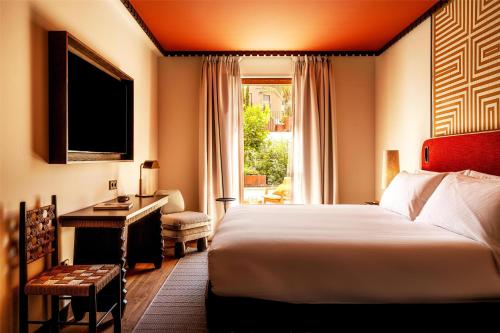 Habitación con cama extragrande, terraza y acceso al spa - Cusco del hotel Palacio De Godoy Caceres, Curio Collection By Hilton. Foto 2