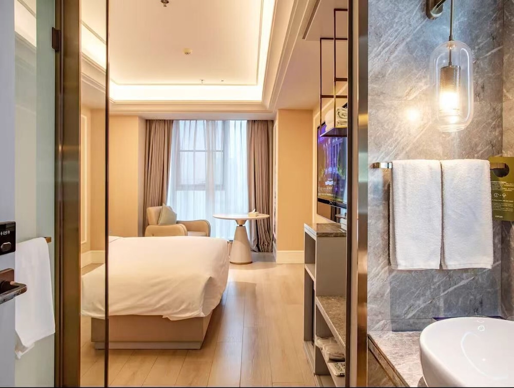 HABITACIÓN ESTÁNDAR, Una Cama Individual del hotel Mercure Shanghai Waigaoq Free Trade Zone. Foto 2