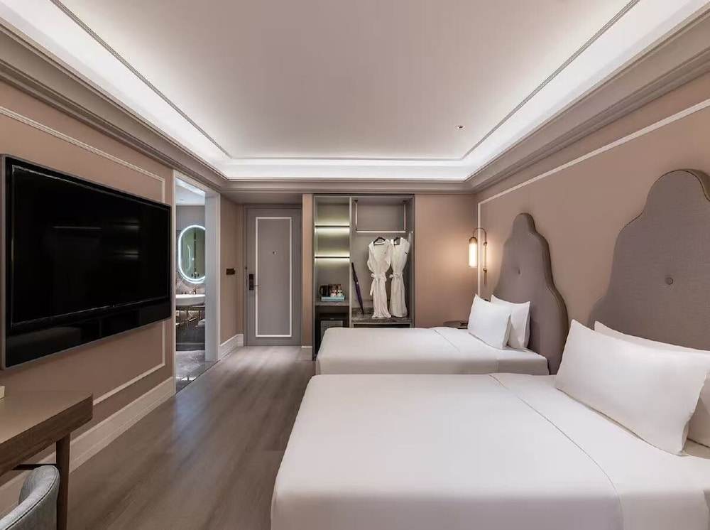 HABITACIÓN DELUXE, Dos Camas Gemelas del hotel Mercure Shanghai Waigaoq Free Trade Zone. Foto 1