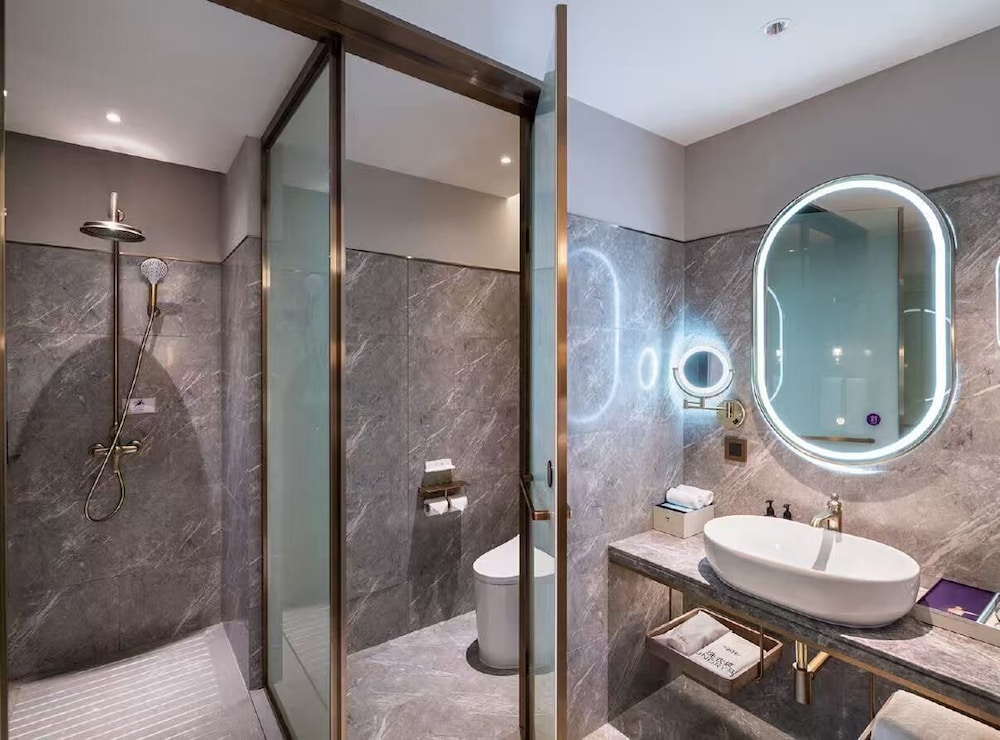 HABITACIÓN DELUXE, Dos Camas Gemelas del hotel Mercure Shanghai Waigaoq Free Trade Zone. Foto 3