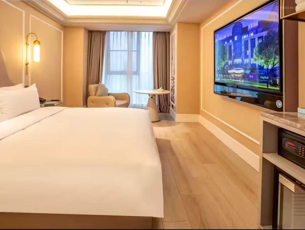 HABITACIÓN PRIVILEGE, Una Cama King Size del hotel Mercure Shanghai Waigaoq Free Trade Zone. Foto 2