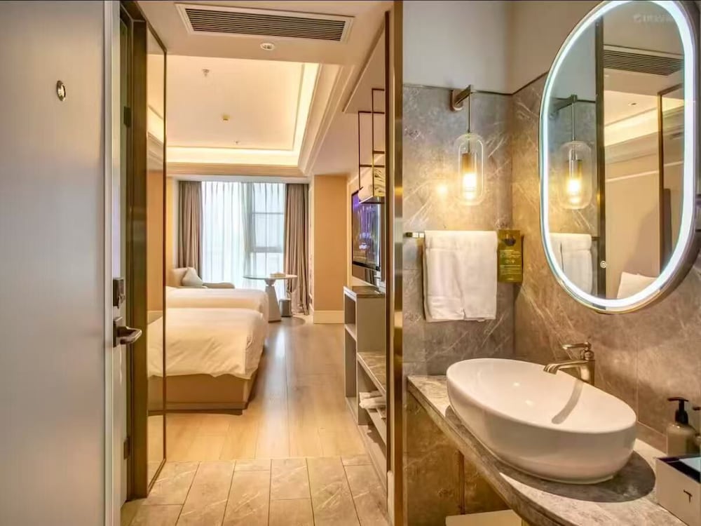 HABITACIÓN PRIVILEGE, Dos Camas Individuales del hotel Mercure Shanghai Waigaoq Free Trade Zone. Foto 1
