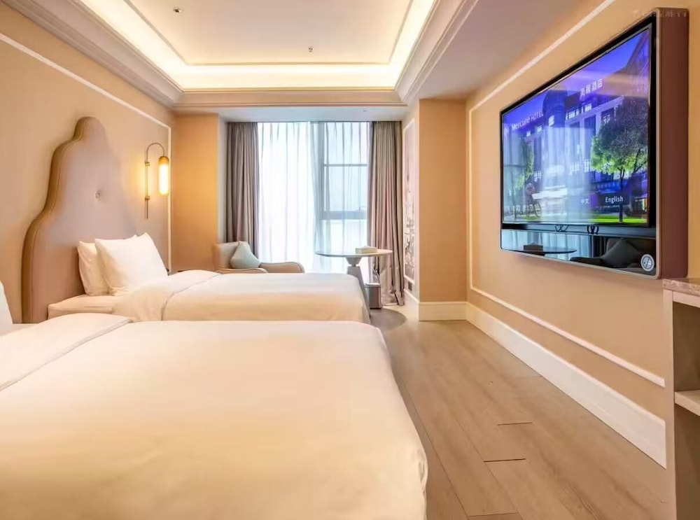 HABITACIÓN PRIVILEGE, Dos Camas Individuales del hotel Mercure Shanghai Waigaoq Free Trade Zone. Foto 2
