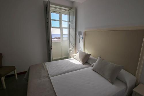 Habitación Doble - 2 camas del hotel Emblemático Holiday Time. Foto 3