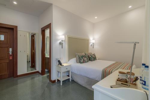 Habitación doble Vista ciudad 1 Cama doble del hotel Emblemático Holiday Time. Foto 5