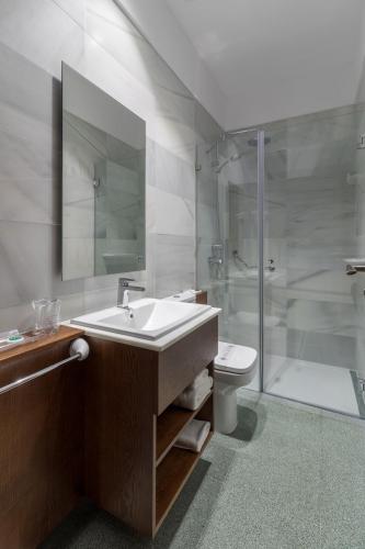 Habitación doble Vista ciudad 1 Cama doble del hotel Emblemático Holiday Time. Foto 6