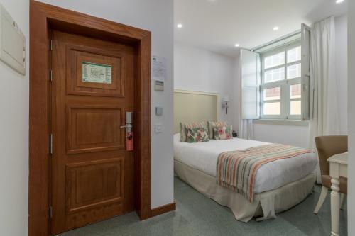 Habitación Doble Económica del hotel Emblemático Holiday Time. Foto 1