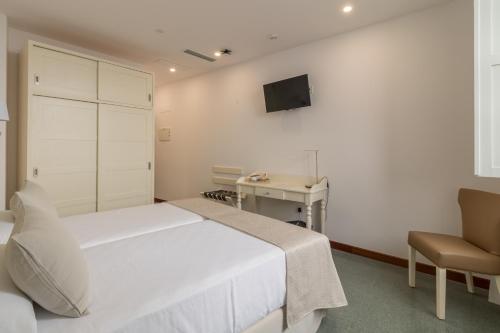 Habitación Doble - 2 camas del hotel Emblemático Holiday Time. Foto 4