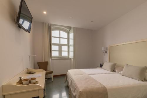 Habitación Doble - 2 camas del hotel Emblemático Holiday Time. Foto 5