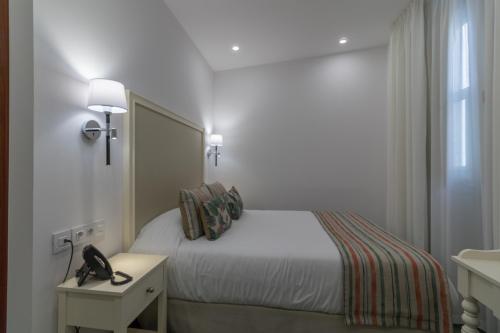 Habitación doble Vista ciudad 1 Cama doble del hotel Emblemático Holiday Time. Foto 2