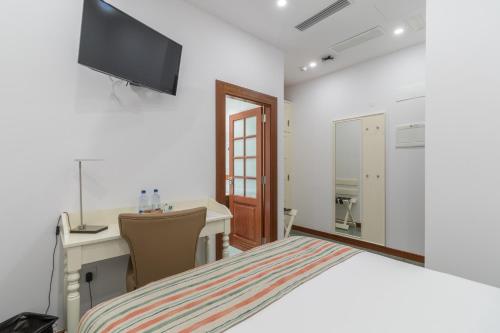 Habitación Doble Económica del hotel Emblemático Holiday Time. Foto 3