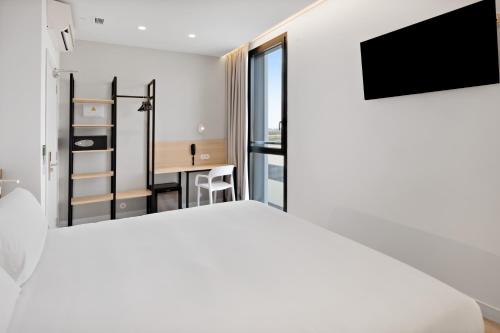 Habitación Familiar del hotel B&B Alicante Aeropuerto. Foto 4