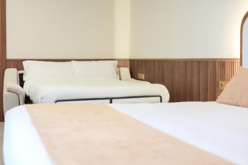 Habitación Triple del hotel Hospedium A Mar. Foto 9