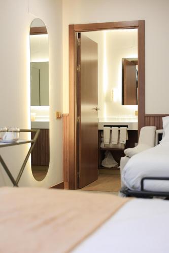 Habitación Triple del hotel Hospedium A Mar. Foto 10