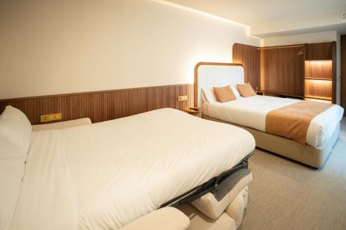 Habitación Triple del hotel Hospedium A Mar. Foto 12