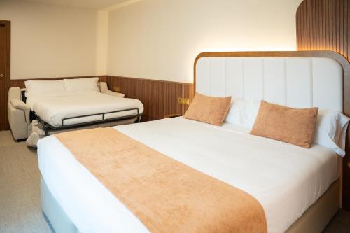 Habitación Triple del hotel Hospedium A Mar. Foto 14