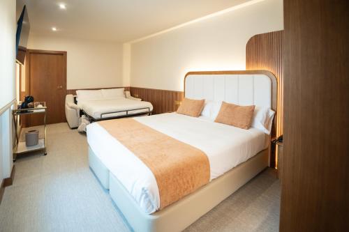 Habitación Triple del hotel Hospedium A Mar. Foto 15