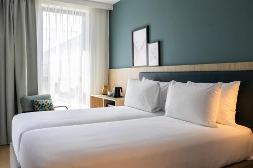 Habitación Doble - 2 camas del hotel Spark By Hilton Madrid Alcala. Foto 2