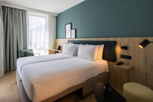 Habitación Doble - 2 camas del hotel Spark By Hilton Madrid Alcala. Foto 4