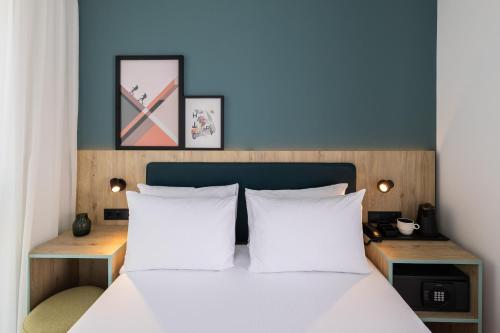 Habitación con cama grande del hotel Spark By Hilton Madrid Alcala. Foto 2