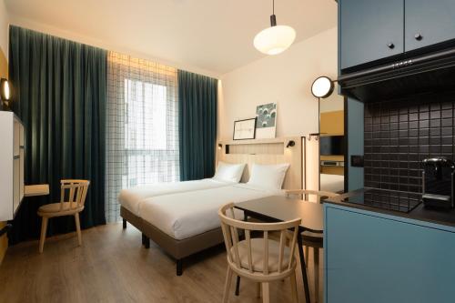 Estudio con camas individuales del hotel Adagio Access Brussels Airport. Foto 4