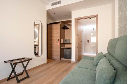 Habitación Doble con cama supletoria del hotel Alora Mérida. Foto 4