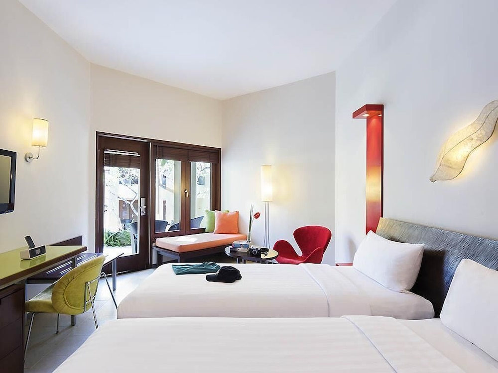Habitación Deluxe con dos camas individuales del hotel Ibis Styles Bali Legian. Foto 4