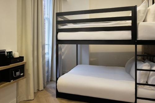 Habitación Cuádruple Económica del hotel The Drey - Kensington, Earl's Court. Foto 4