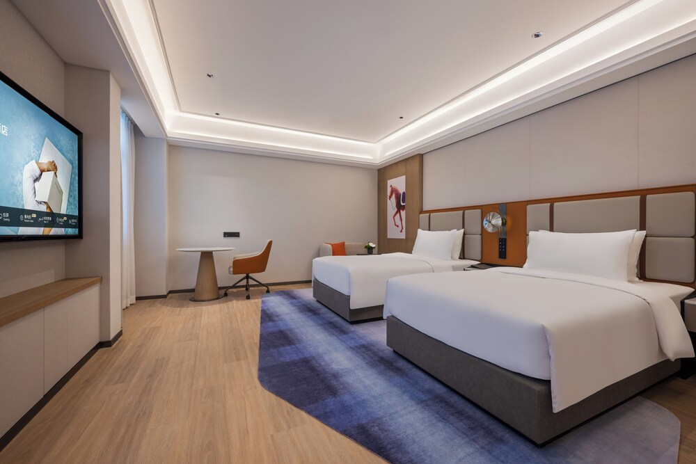 Habitación Superior con Dos Camas Individuales del hotel Novotel Shanghai Hongqiao International Airport. Foto 2