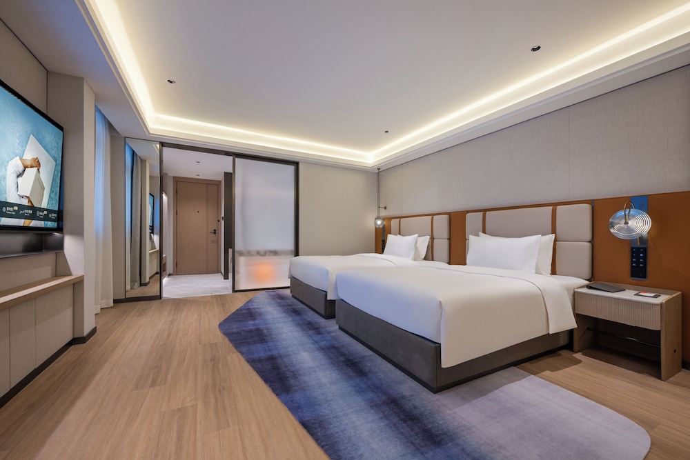 Habitación Deluxe con dos camas individuales del hotel Novotel Shanghai Hongqiao International Airport